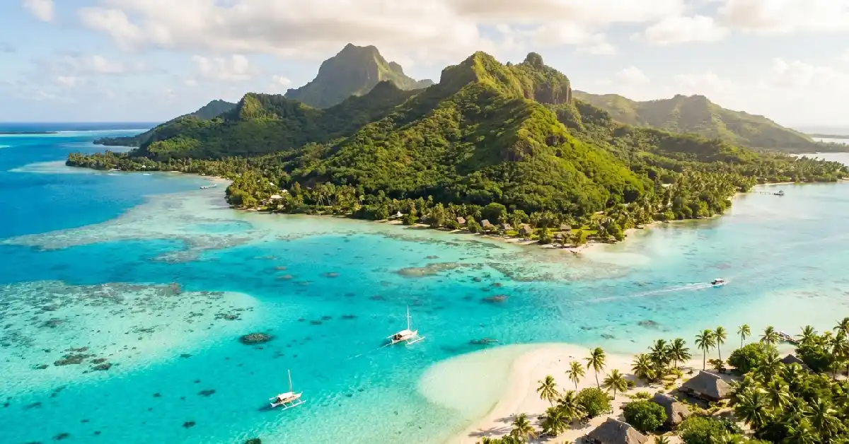 Aerial view of Maupiti island, French Polynesia – the ultimate hidden gem and Bora Bora alternative in the Oceania islands travel guide