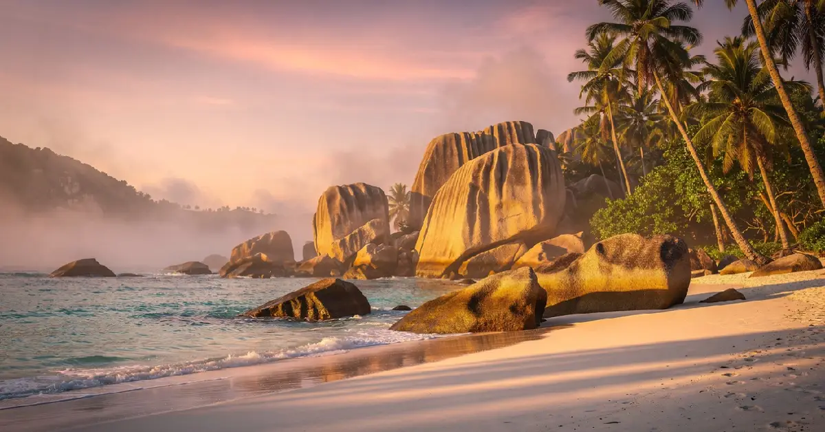 most beautiful beaches in the world Seychelles sunrise granite boulders golden ocean