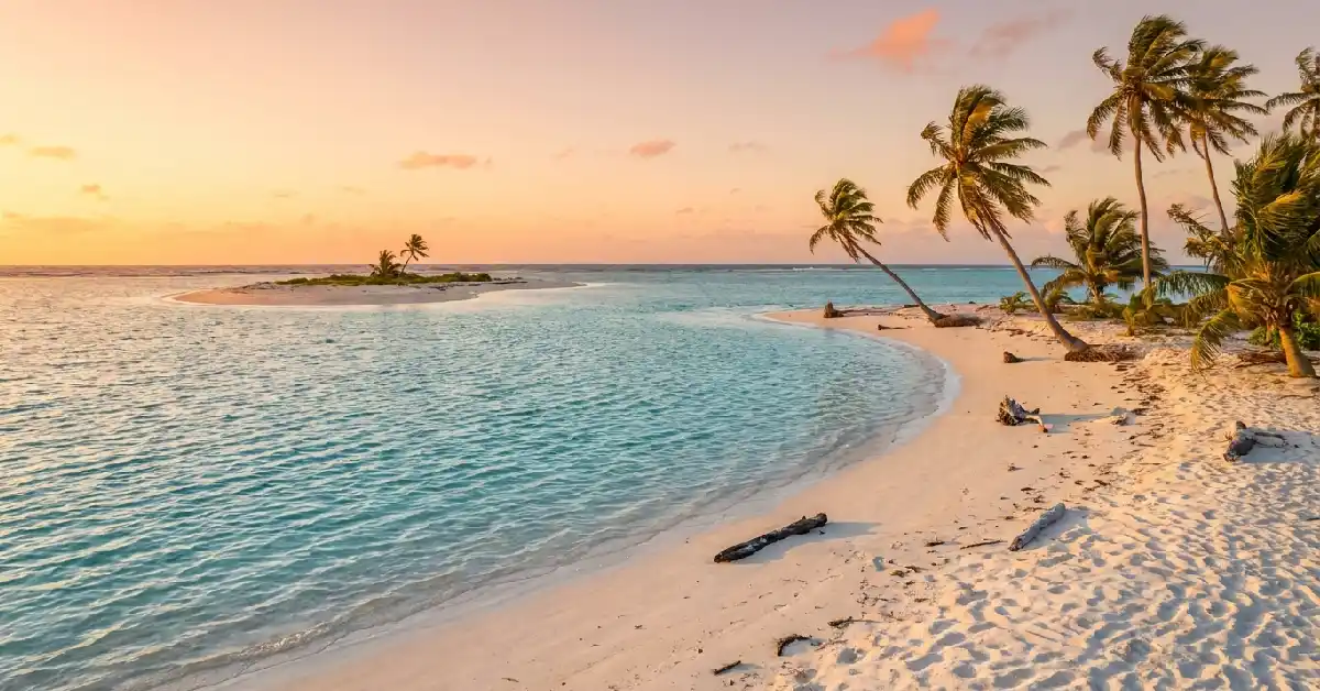 Unspoiled white sand beach on a remote Tuvalu atoll – one of the most peaceful hidden gems in oceania islands travel guide