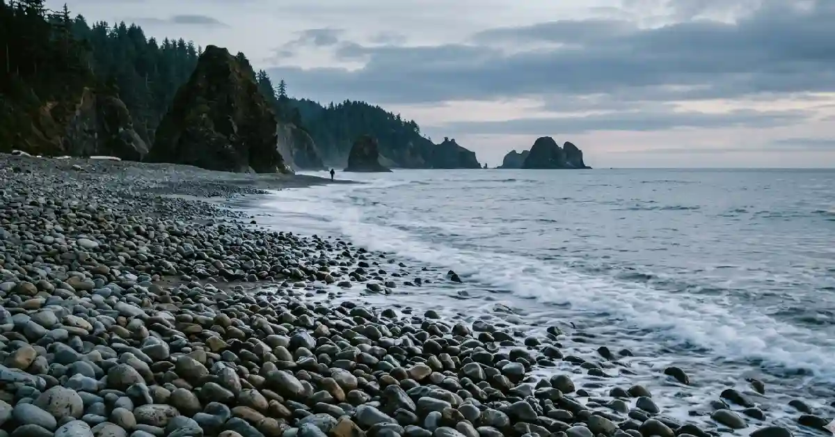 Cobblestone shoreline at Cove Beach, a quiet hidden beach near Cannon Beach, Oregon